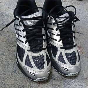 Nike Pegasus Black and Metallic Sneakers